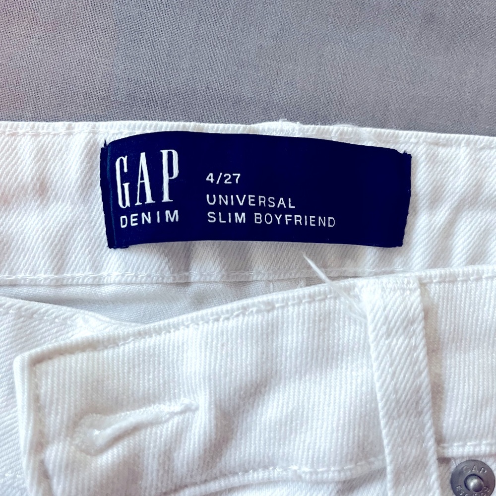 Size 4, universal slim, ripped hem, boyfriend jeans